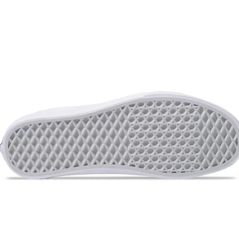 Vans All-White Low-Top Sneakers